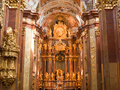 The ornate details, paintings and gold highlights in the nave at Melk.
