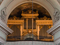 The 1858 Buckow organ tucked intp the gallery of the Piarist Church in Vienna.