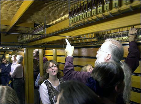 Michael Barone explains the inner workings of an organ to students