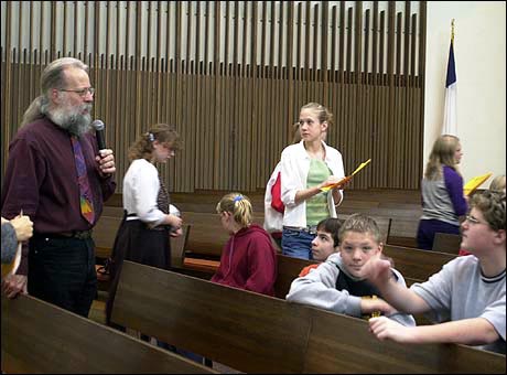 Michael Barone introduces students to the world of organ music.