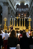 [The choir rehearses behind the altar at Saint Sulpice.]